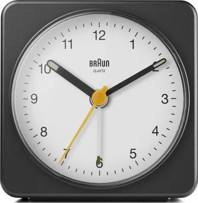 A close-up, front-facing view of a Braun alarm clock.