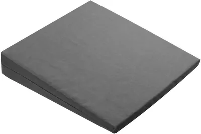 A gray wedge pillow is shown from a diagonal angle against a white background.