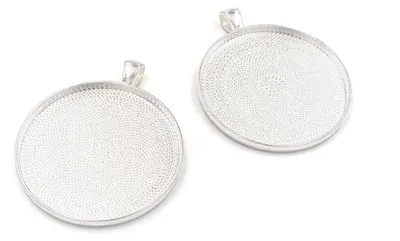Produktbild von Vintageparts Fassungen Metall silberfarben verziert rund 50 mm für 40 mm Cabochons, 2 Stück