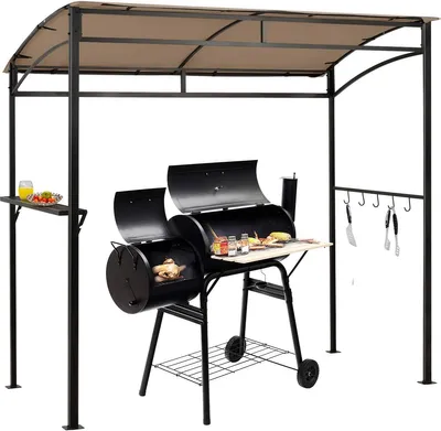 A black grill pavilion with a tan canopy, featuring a grill, shelves, and hanging hooks.