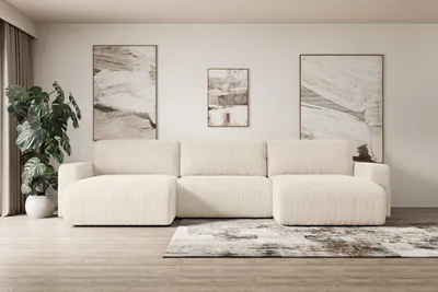 A modern living room with a large U-shaped sectional sofa, abstract art on the wall, and a potted plant.