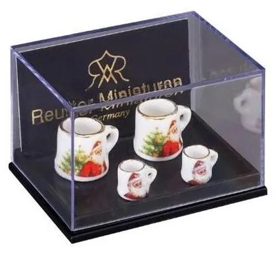 Immagine prodotto di 4 boccali in miniatura di porcellana con decorazioni natalizie