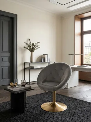 Design Drehsessel von oben in einer Wohnzimmer-Einrichtung, zeigt die kompakte Form und wie er sich harmonisch in eine gemütliche Lese-Ecke einfügt._#sku_SAFWL6.299#