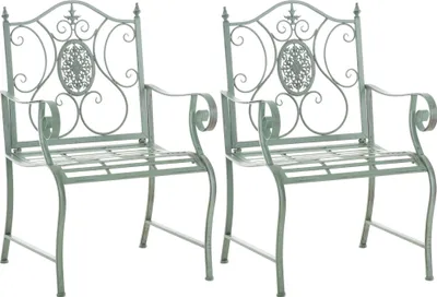 Two green metal garden chairs are shown against a white background.
