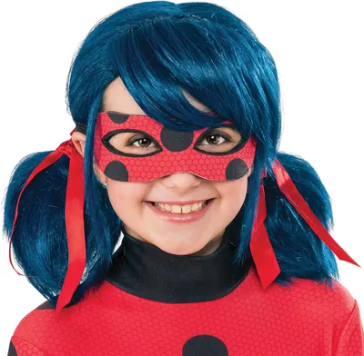 A young girl wearing a Miraculous Ladybug costume, including a wig and mask.