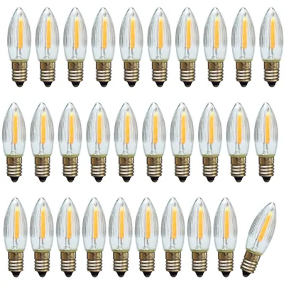 A grid of LED filament light bulbs.
