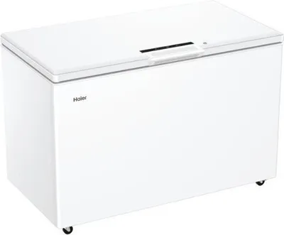 A white Haier chest freezer is shown from a three-quarter front angle on a white background.