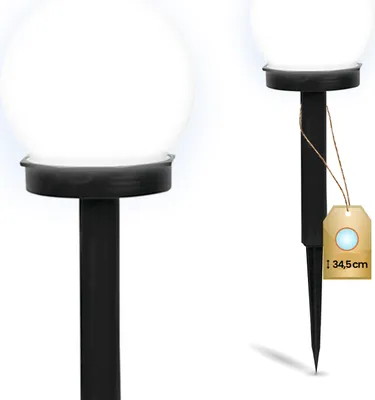 Two solar garden lights are shown against a white background. One is in focus on the left, and the other is slightly out of focus on the right with a product tag.