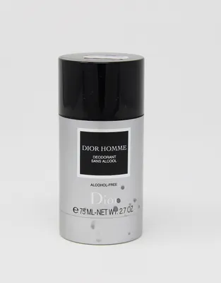 A product shot of a Dior Homme deodorant stick against a white background.