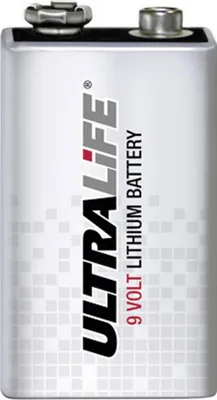 A close-up studio shot of a silver 9-volt lithium battery with black and red text.