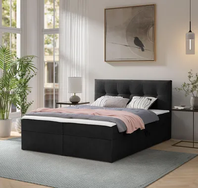 A bedroom scene with a bed, nightstand, and window.