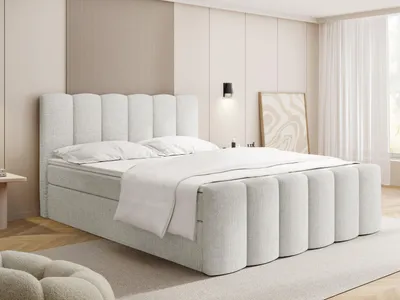 Produktbild von Boxspringbett mit Bettkasten – Polsterbett 180 x 200 cm mit H4 Taschenfederkern 7-Zonen Matratze & 5 cm Topper – Stauraumbett Serenity mit Hohem Kopfteil & Gepolstertem Fußteil – Weiß Chenille