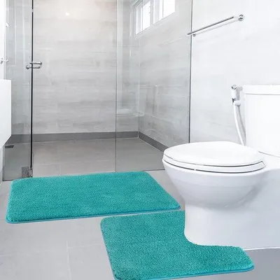 Obrázok produktu pre Sada dvoch podložiek do kúpeľne Unyqoos®: mäkká mikrovláknová podložka pod vaňu/sprchu (50 x 80 cm) a podložka pod toaletu (50 x 50 cm), s protišmykovou TPR spodnou stranou, farba: tyrkysová
