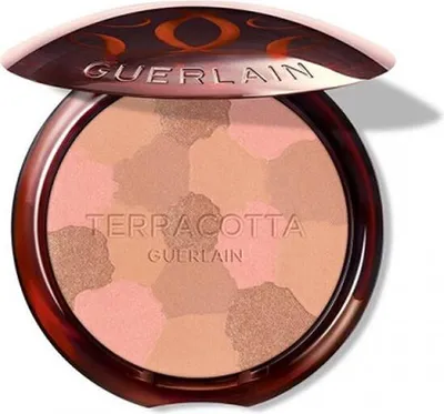 A Guerlain Terracotta Light bronzing powder compact with the lid open.