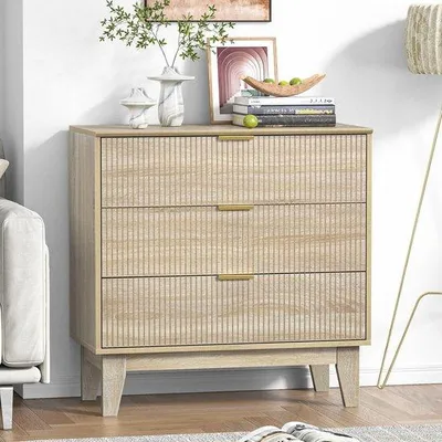 Immagine prodotto di Azomor: comò moderno a tre cassetti con finitura in legno naturale, adatto a qualsiasi ambiente