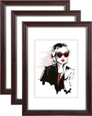 Three dark brown picture frames are stacked on top of each other, with the front frame displaying a fashion illustration of a woman wearing sunglasses.