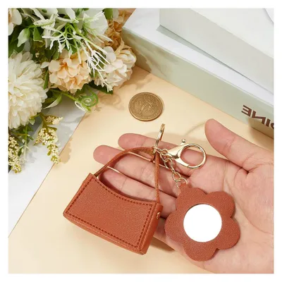Produktbild von Kleine Kosmetiktasche Mit Blumenspiegel Brown Kunstleder Handtasche Schlüsselanhänger Tragbar Mini Leder Wechselgeldbeutel Münzbörse Geldbörse Tasche Charm Anhänger Schlüsselanhänger