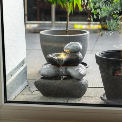Produktbild von esotec Solar Felsenbrunnen mit Akku + LED Licht Springbrunnen wetterfest 101323