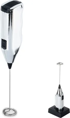 A silver electric milk frother with a black accent on top and a smaller frother in its stand.