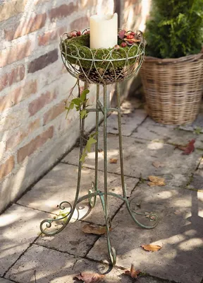 Image de Support décoratif "Ornamente" vert avec finition rouille, support métallique avec corbeille, bac à plantes, panier à fleurs