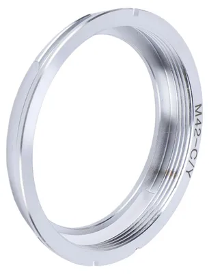 Zdjęcie produktu dla Adapter do obiektywów, kompatybilny z aparatami marki Contax. Umożliwia montaż obiektywów z mocowaniem M42 do aparatów z mocowaniem CY. Pierścień adaptera