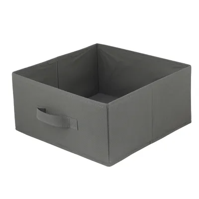 An empty, dark gray fabric storage box with a handle on the side, shown from a slightly elevated diagonal angle.