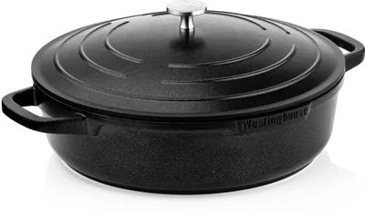 A black cast iron pot with a silver lid handle is shown on a white background.