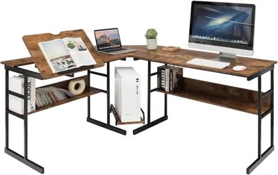 An L-shaped desk with a laptop, monitor, computer tower, and books.