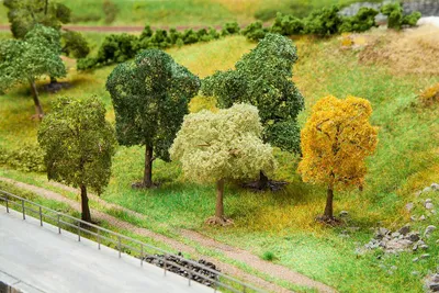 Produktbild von Faller 5 PREMIUM Bäume, sortiert 181171
