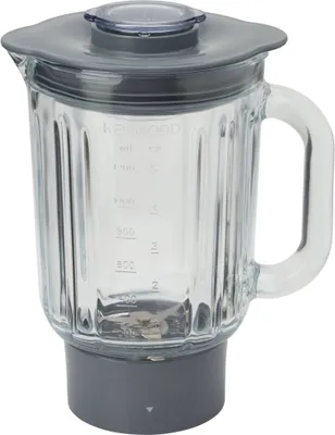 A close-up studio shot of a blender jug with a lid and base.