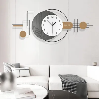 Image de Grande horloge murale au design géométrique, idéale pour le salon et la chambre