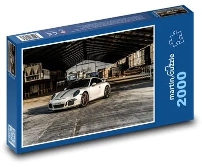Obrázok produktu pre Puzzle 2000 Biele auto v hangári - martinpuzzle