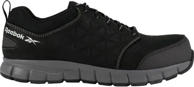 A side view of a black Reebok safety shoe.