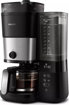 A black and silver Philips coffee maker with a glass carafe is shown against a white background.