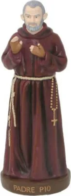 A figurine of Padre Pio standing on a base.
