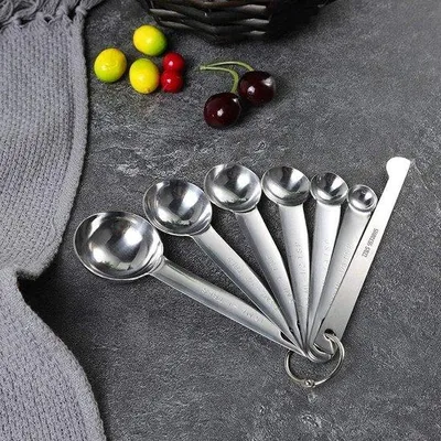 Produktbild von Famanu Messbecher- und Messlöffel-Set RVS mit Messlineal, 7 Löffel und 5 Bechern, komplette Messset für Backen und Kochen