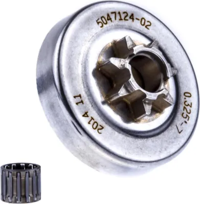 A close-up studio shot of a chainsaw clutch drum and a needle bearing.