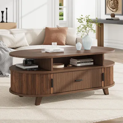 Imagen del producto de Mesa de centro oval Merax con 1 cajón y 2 puertas abatibles, mesa de centro para sala de estar con estantes abiertos, mesa auxiliar para sofá con 4 patas de MDF, color nogal