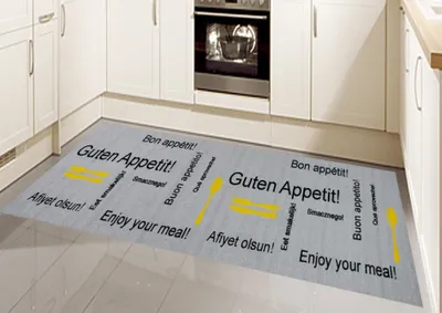 Zdjęcie produktu dla Dywanik kuchenny nadający się do prania z napisem „Guten Appetit” w kolorze szaro-żółtym, wymiary: 80 x 300 cm