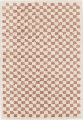 A close-up, top-down view of a shaggy rug with a checkerboard pattern.
