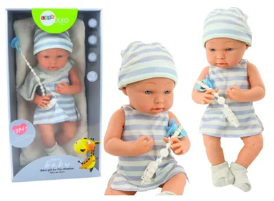 Produktbild von Babypuppe in blauer und weißer Kleidung, Mütze, Schnuller, Lätzchen, Steppdecke
