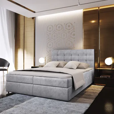 A luxurious bedroom with a large bed, bedside tables, and decorative wall panels.