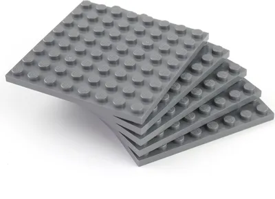 A stack of five dark gray LEGO baseplates.
