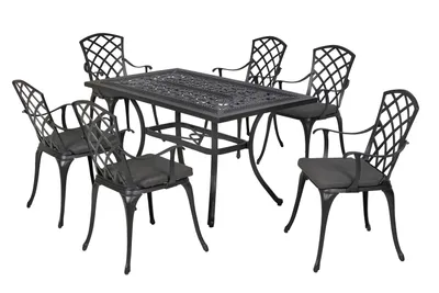 A set of outdoor furniture, including a table and six chairs, displayed on a white background.