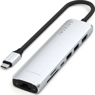 A silver Satechi USB-C multi-port adapter with a black braided cable and USB-C connector, shown on a white background.