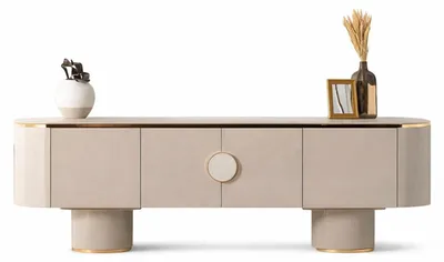 Obrázok produktu pre Elegantná nízka skrinka so zlatými akcentmi a minimalistickým dizajnom