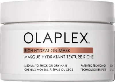 A white jar of Olaplex Rich Hydration Mask.