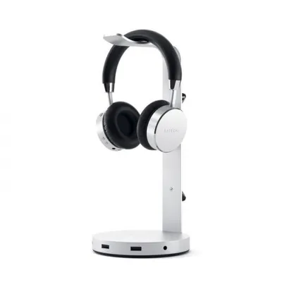 A pair of headphones on a silver stand.