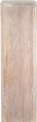 A close-up, full-frame shot of a wooden pedestal with a whitewashed finish.