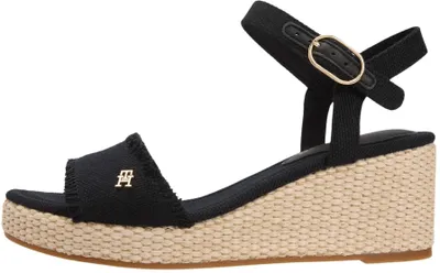 Immagine prodotto di Tommy Hilfiger, sandali con zeppa da donna, modello intrecciato con frange, colore nero, taglia 42